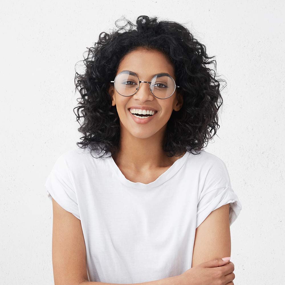 smiling-woman-wearing-glasses-and-white-t-shirt-2026-01-07-01-11-12-utc.jpg